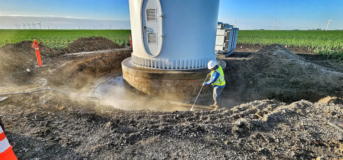 A wind turbine base with its foundation excavated